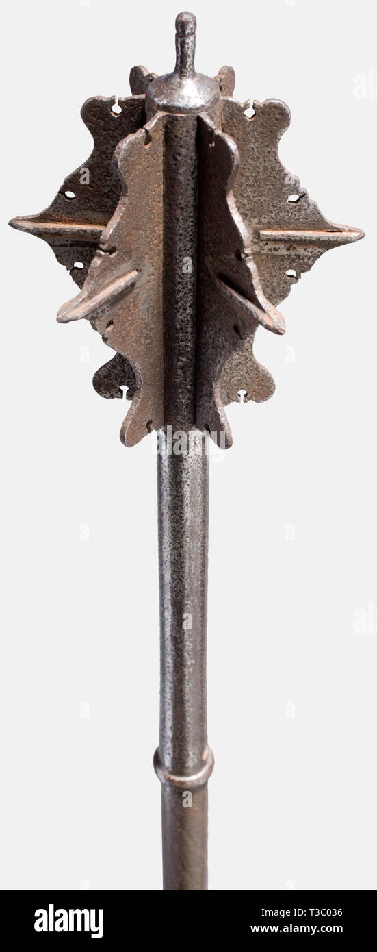 A German or Italian mace, 2nd half of the 16th century Large striking head with six curved flanges. The points have copper-solder reinforcements of quadrangular section. Hollow forged, lightly tapered shaft with holes for a lanyard. Helically grooved grip with incised decoration. Hemispherical, grooved pommel. Length 60.5 cm. historic, historical, 16th century, axe, ax, axes, ax, tool, tools, military, militaria, fighting device, object, objects, stills, battle ax, battle axe, poleaxe, battle axes, battle axes, poleaxes, clipping, cut out, cut-ou, Additional-Rights-Clearance-Info-Not-Available Stock Photo