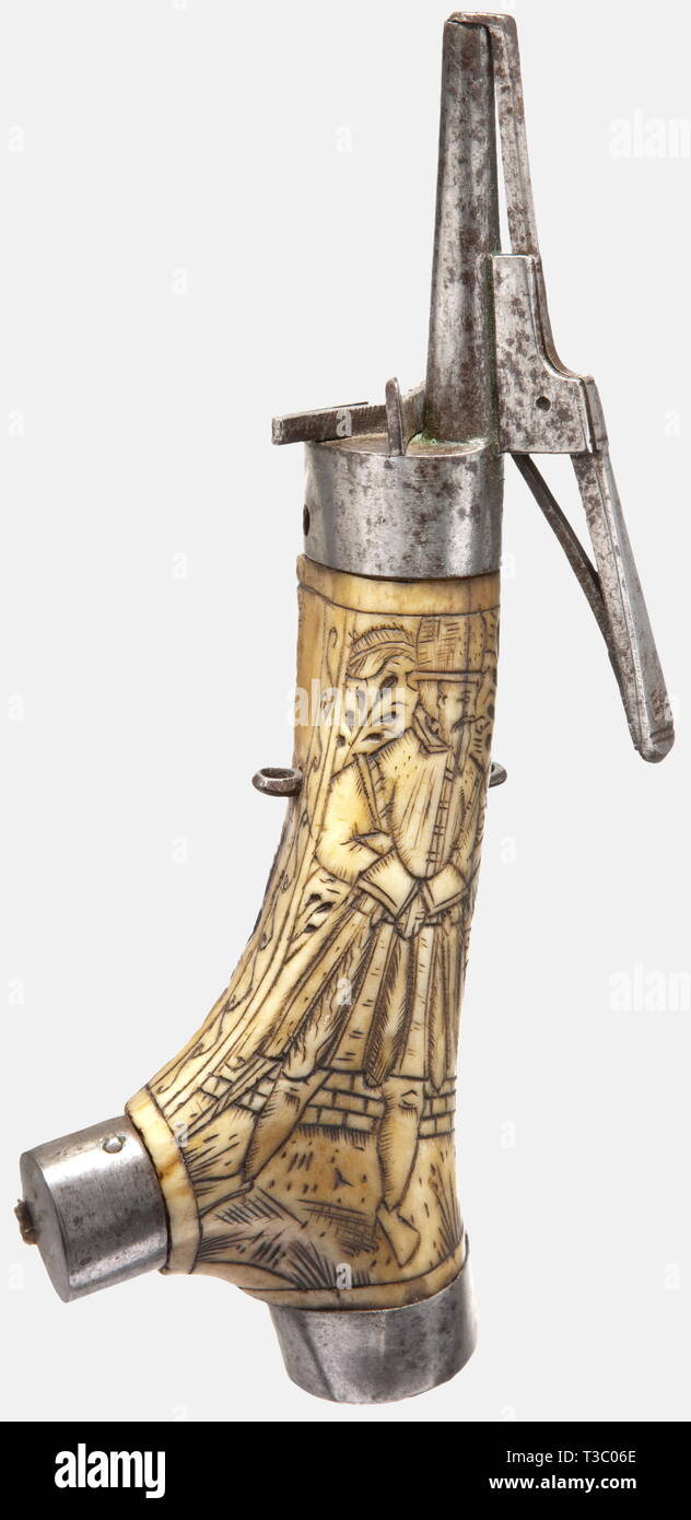 A German powder flask, circa 1580. Made from the fork of an antler with a finely engraved figure of a Landsknecht on the front, and the back left in natural condition. Iron mountings with a spring loaded measure and spout. Height 24 cm. historic, historical, 16th century, powder flask, accessory, accessories, military, militaria, object, objects, stills, utilities, utility, clipping, clippings, cut out, cut-out, cut-outs, utensil, piece of equipment, utensils, Additional-Rights-Clearance-Info-Not-Available Stock Photo