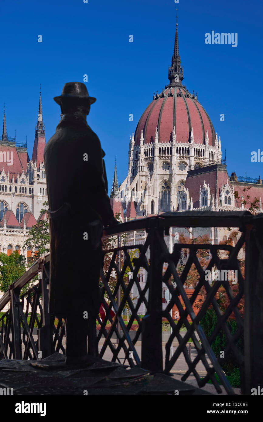 Hungary, Budapest, Statue of Imre Nagy, Communist Politician and reformer who was executed after the 1956 Revolution with Hungarian Parliament Building in the background. Stock Photo