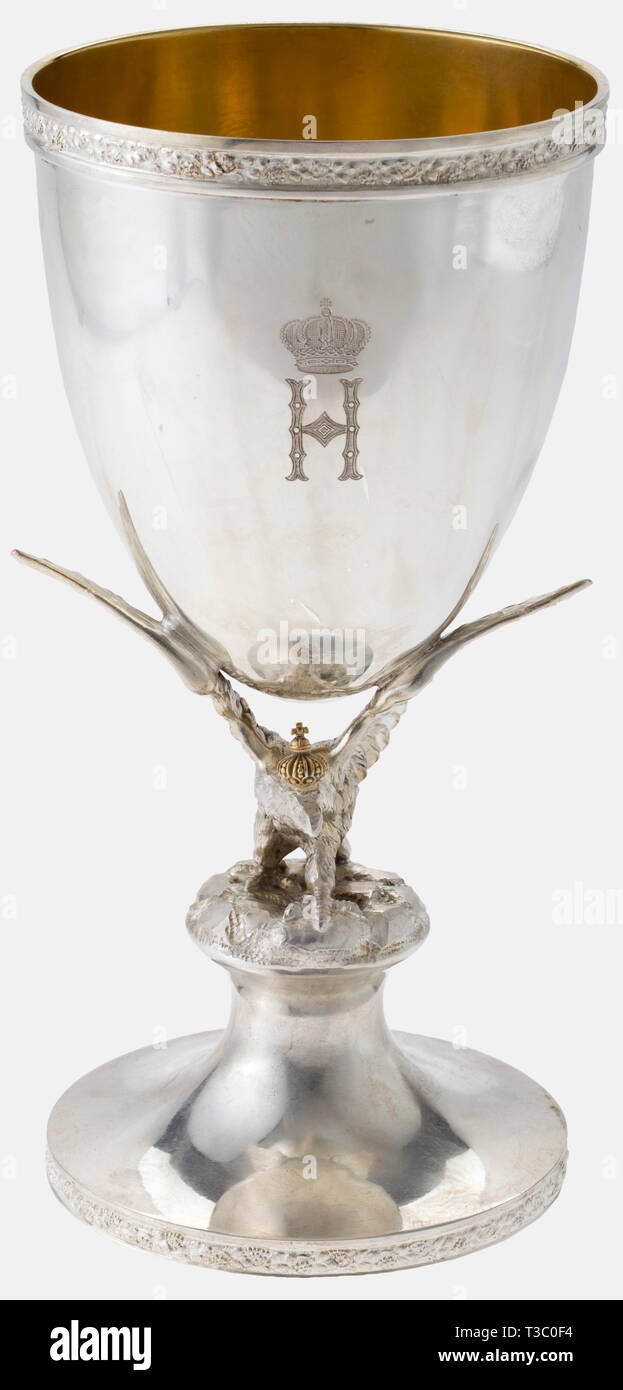 The following lots come from the estate of the most successful naval aviator of World War I, Friedrich Christiansen (1879 - 1972), later General der Flieger (Lt. General) in the Luftwaffe. During World War I, he first served in the 1st Torpedo Division. I, a silver cup commemorating the award of the Pour le mérite 1917 A present from Prince Heinrich of Prussia. Silver with gilt interior, paraboloid cup supported by the wings of a (likewise gilt) crowned Prussian eagle resting on a bell-shaped foot. The front engraved with the Prince's crowned monogram 'H', the reverse with , Editorial-Use-Only Stock Photo
