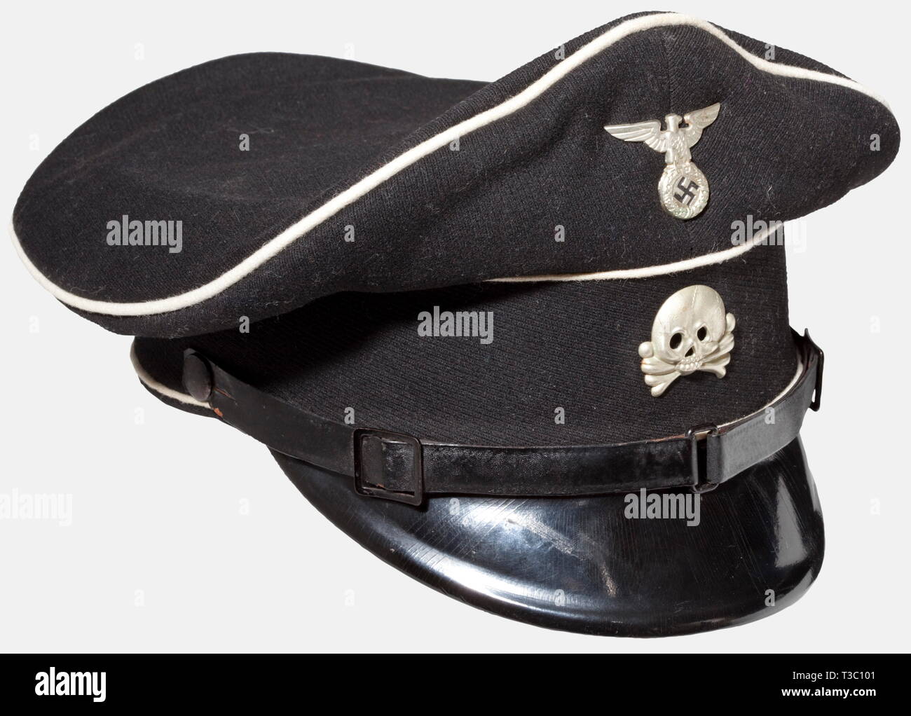 A visor cap for SS enlisted men/NCOs, early model Cap body of black woolen material with white piping and silver-plated metal insignia in the early form, three-piece patent leather chinstrap. Inner liner of brown cotton and oil cloth. Leather sweatband. Size 56. Ordinarily, these early pieces did not carry SS or RZM markings. historic, historical, 1930s, 1930s, 20th century, Waffen-SS, armed division of the SS, armed service, armed services, NS, National Socialism, Nazism, Third Reich, German Reich, Germany, military, militaria, utensil, piece of equipment, utensils, object, Editorial-Use-Only Stock Photo
