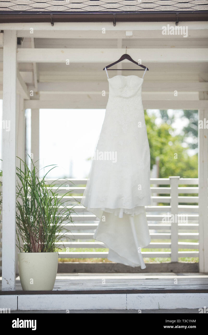 Hanging dress hi-res stock photography and images - Alamy