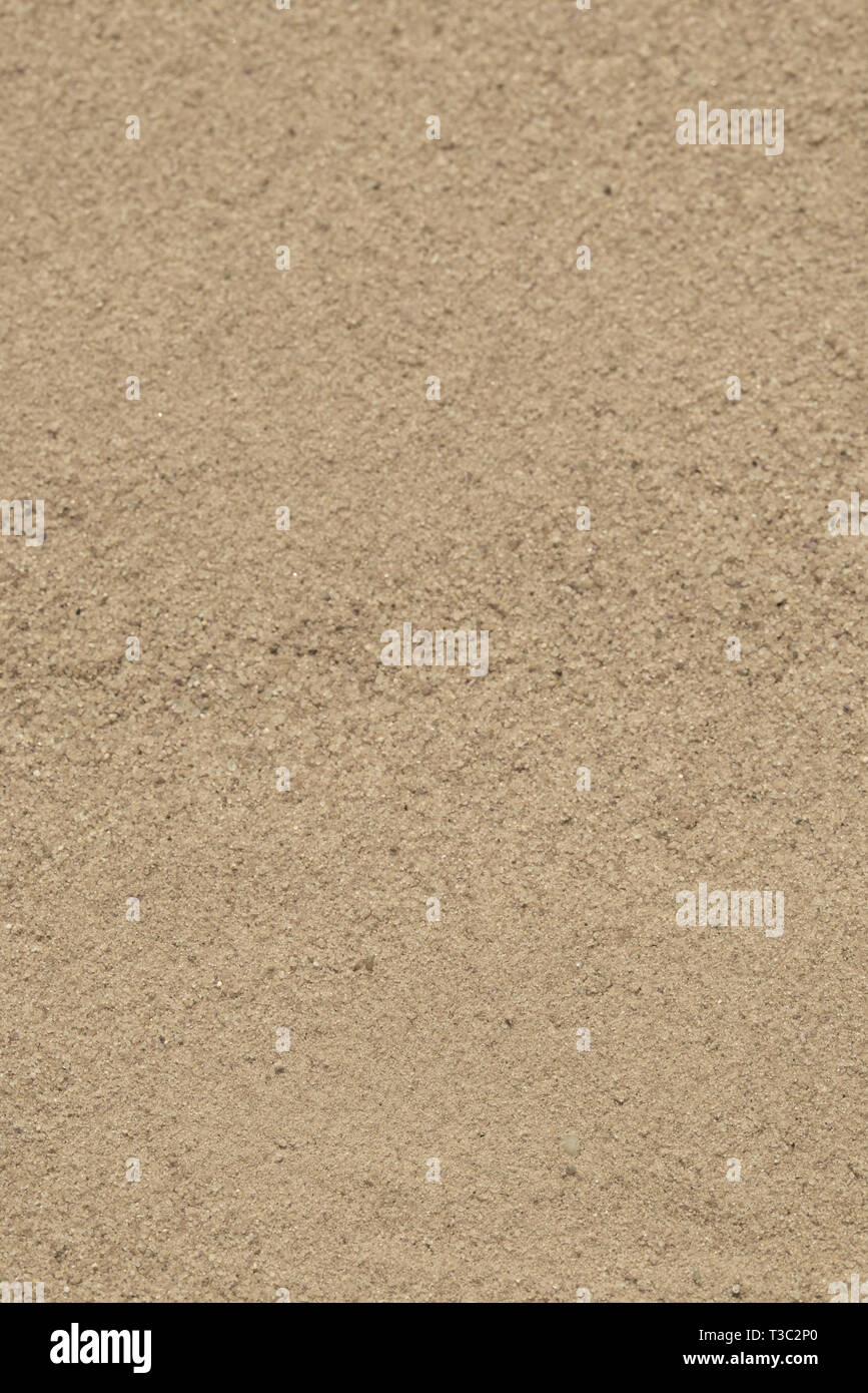 golden sand background texture selective focus vertical Stock Photo