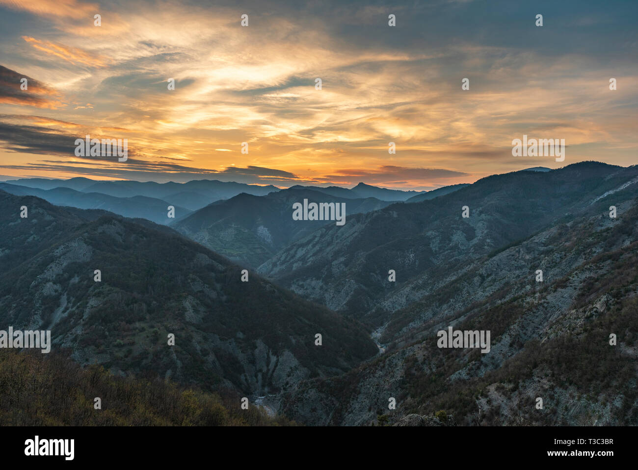 Colorful sunset in the mountain Stock Photo - Alamy