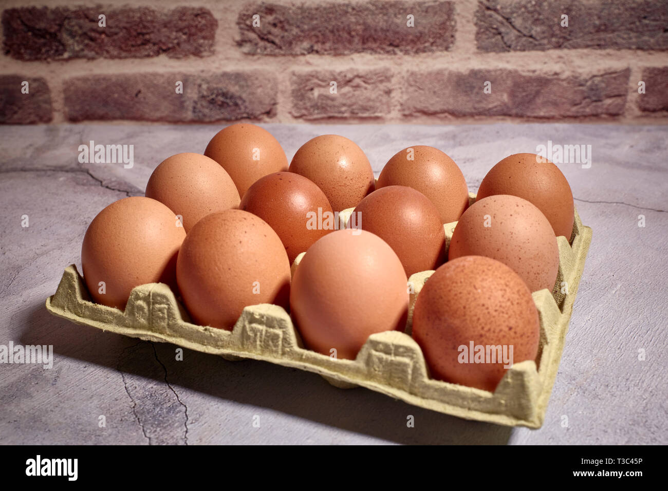Download Orange Eggs Of Farm Chicken On A Yellow Cardboard Box Stock Photo Alamy PSD Mockup Templates