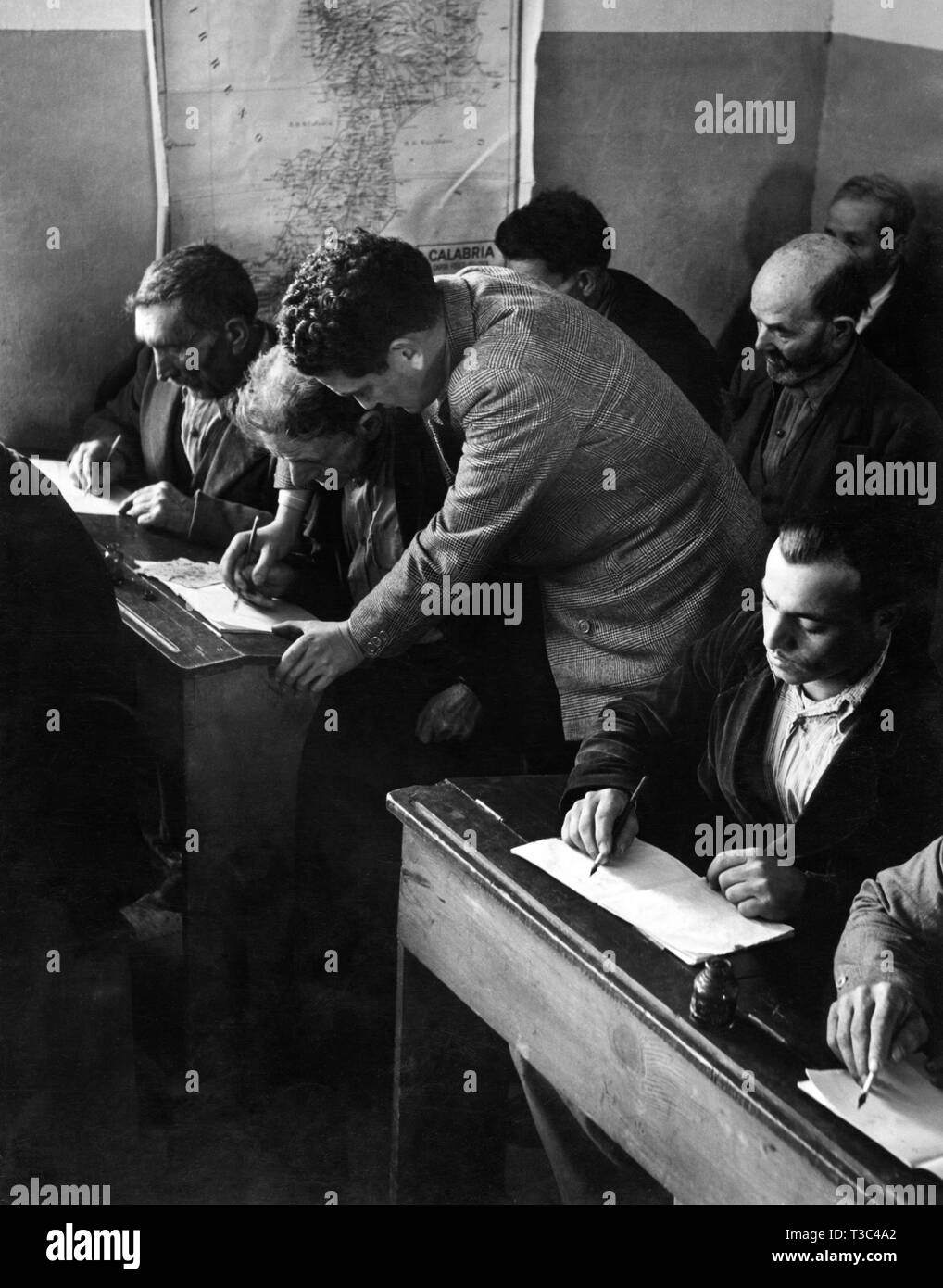 men, illiteracy, primary school, 1952 Stock Photo