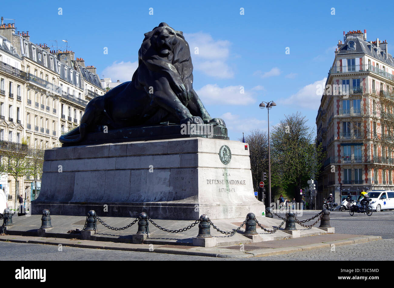 Lion of  Belfort, a monumental sculpture of a lion by Bartholdi, of hammered copper, Place Denfert Rochereau in Paris, commemorates siege of Belfort Stock Photo