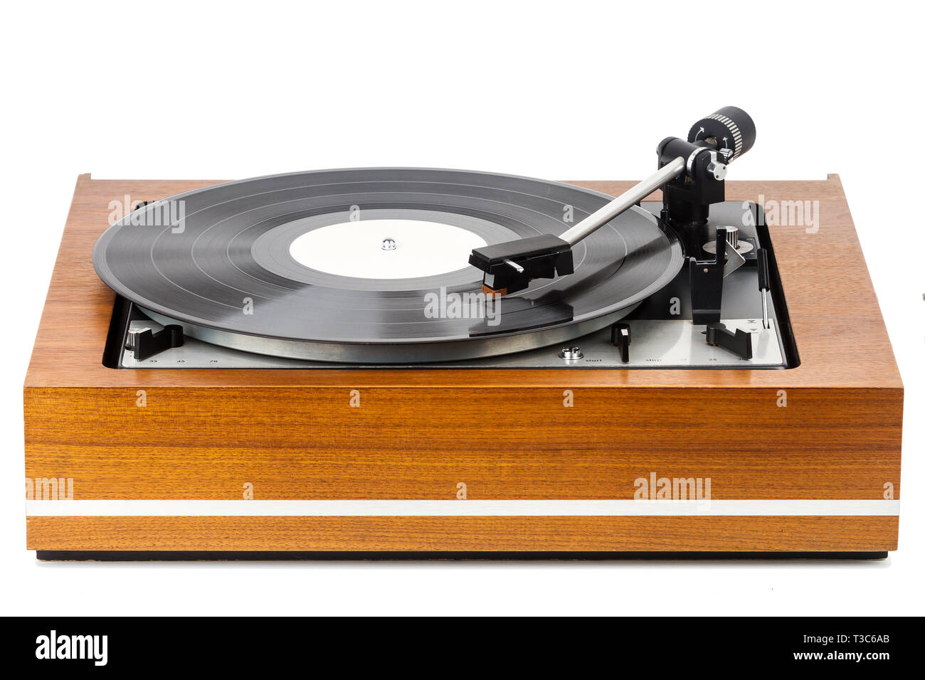 Vintage turntable vinyl record player isolated on white. Wooden plinth ...