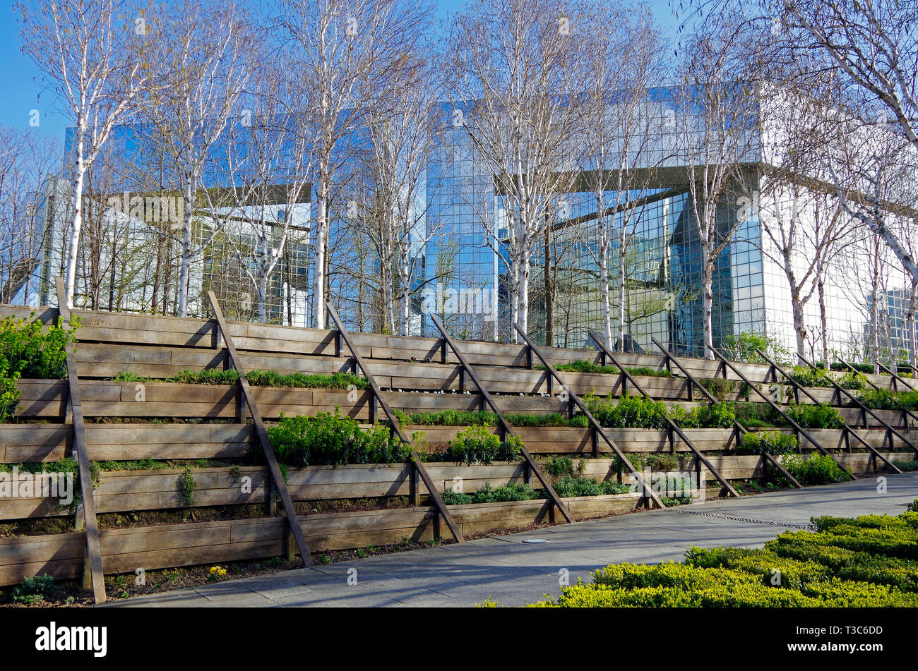 Buildings for various government offices, all clad in reflective glass, overlooking the Parc André Citroen, which they do nothing to enhance. Stock Photo
