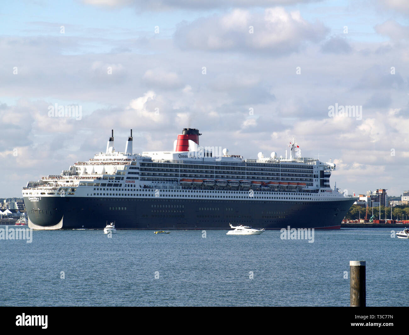 RMS Queen Mary 2 at Southampton Docks, photograph taken from Hythe Marina, Hampshire, England, UK Stock Photo