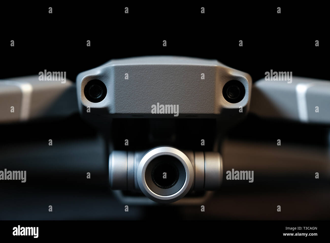 Close-up of the front of a DJI Mavic 2 Zoom drone showing the camera and  forward facing sensors. Studio shot with copy space Stock Photo - Alamy