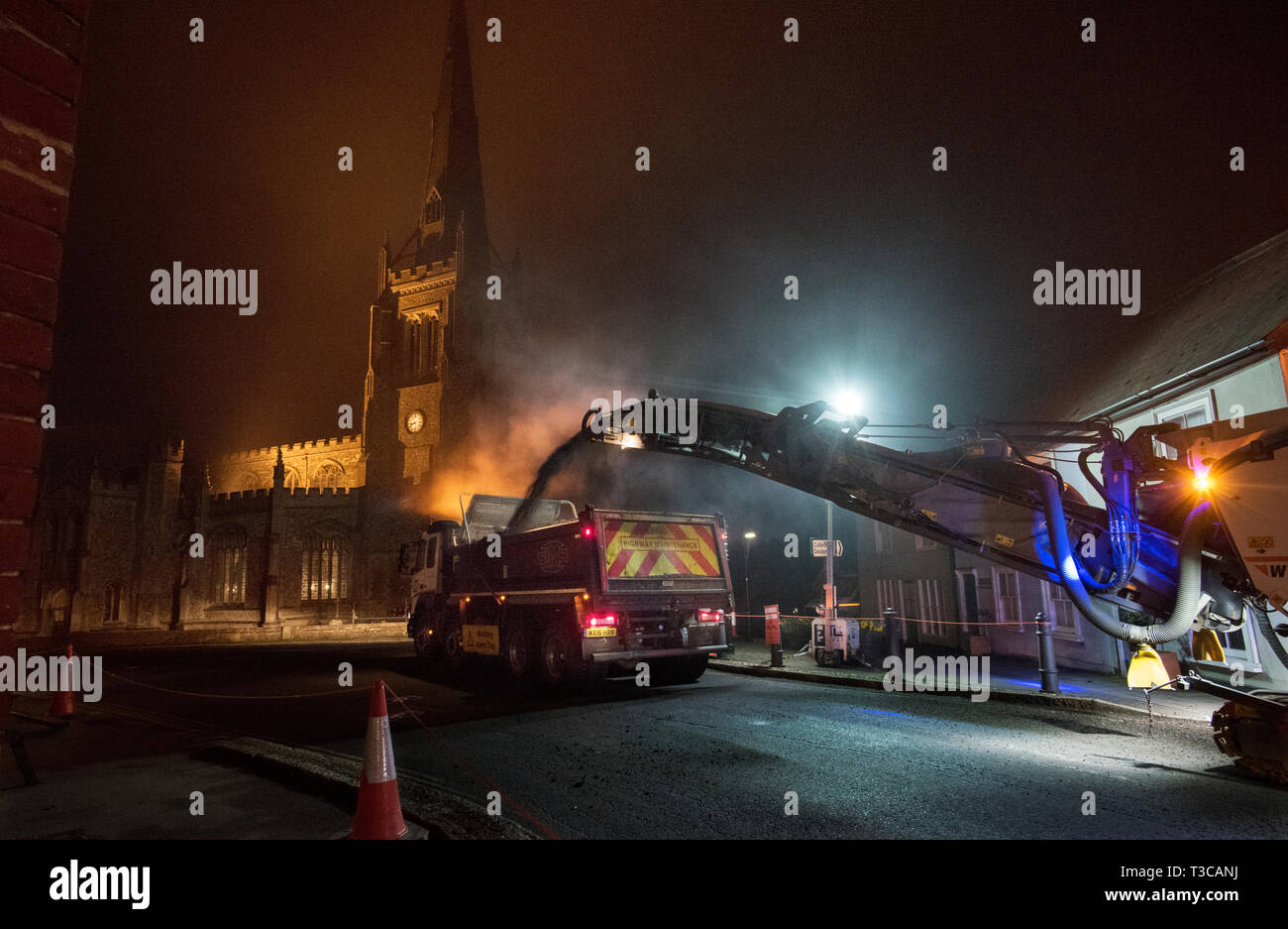 Thaxted Essex England UK. Major resurfacing work for 7 nights 5 April to 12 April 2019 Night Work: Photograph shows the busy night scene as workers fr Stock Photo