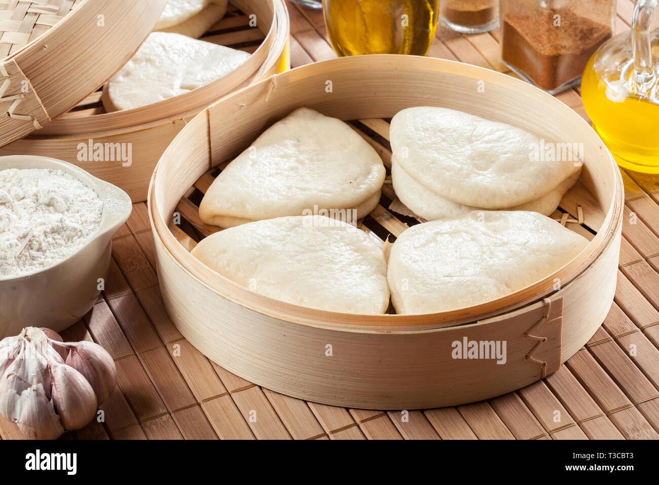Gua bao, steamed buns in bamboo steamer. Asian cuisine Stock Photo Alamy