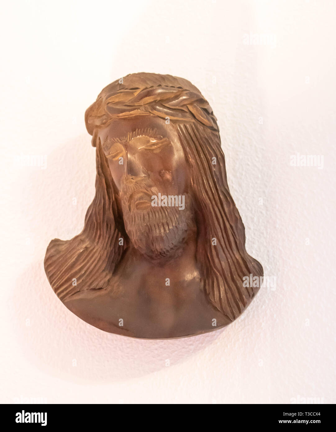 Wooden statue, head of Jesus Christ on the cross Stock Photo