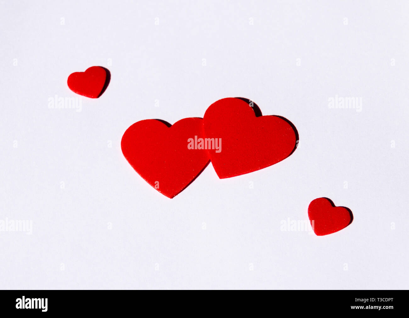 Postcard of red hearts on white background Stock Photo Alamy