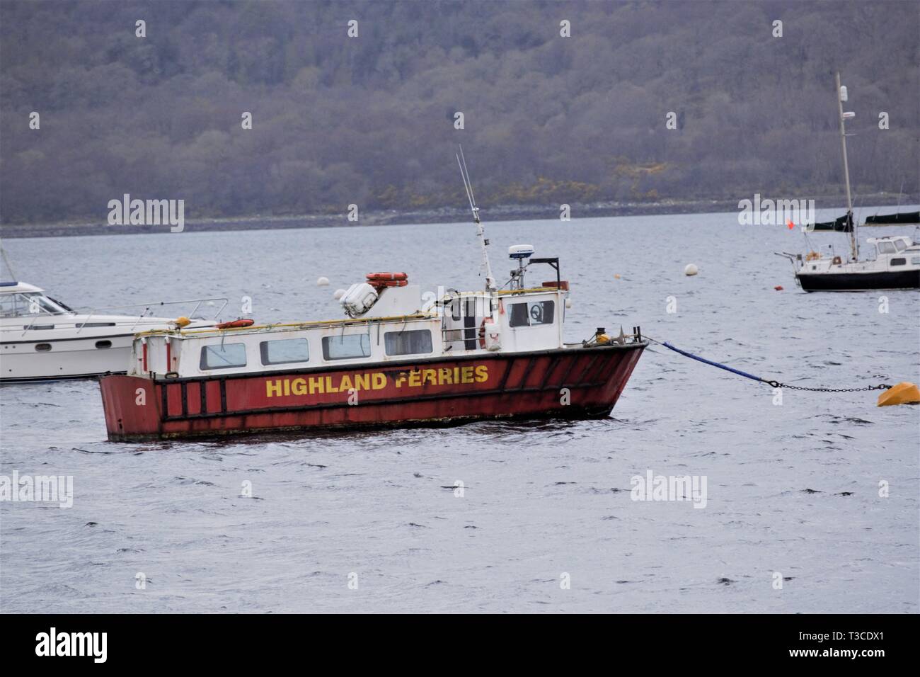 Highland Ferries boat at anchor in Loch Creran moorings. Stock Photo