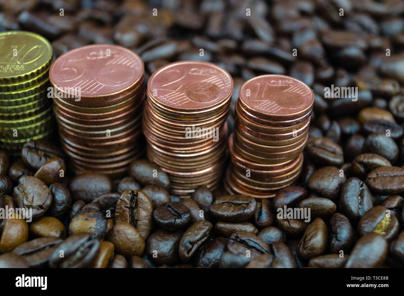 fair trade coffee Price roasted coffee beans and money Stock Photo
