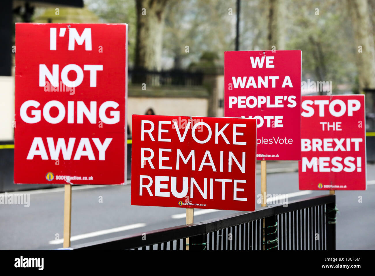 Brexit protest placards are seen outside the Houses of Parliament. British Prime Minister Theresa May will travel to Berlin and Paris on Tuesday, 9 April to meet with Chancellor of Germany - Angela Merkel and President of the French - Emmanuel Macron ahead of a crunch Brexit summit in Brussels on Wednesday, 10 April. Stock Photo