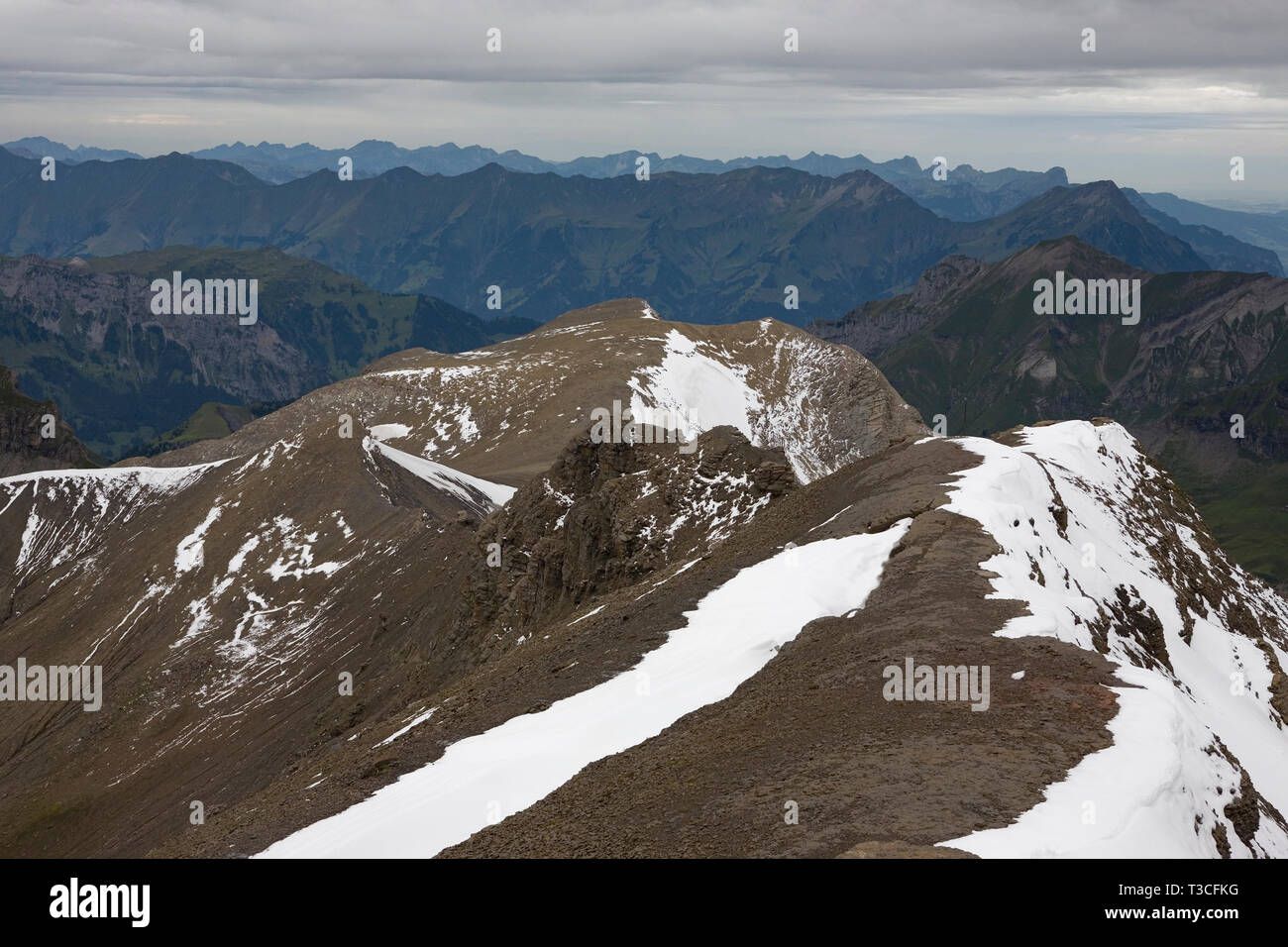View west from Schilthorn, Bernese Oberland, Switzerland, with Sattel and Chilchflue closest Stock Photo