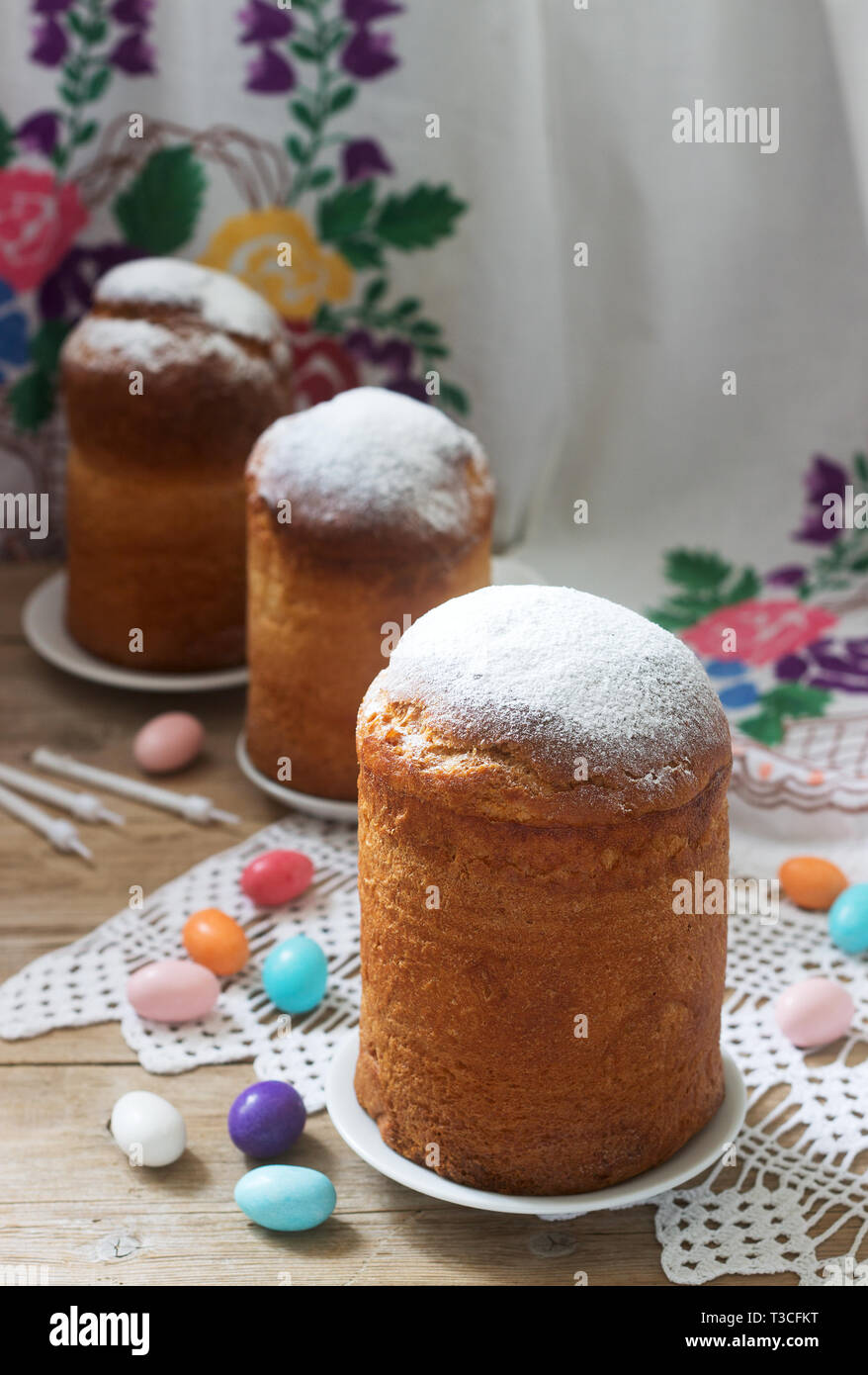 Traditional homemade Easter cake in the Easter decoration. Rustic style, selective focus. Stock Photo
