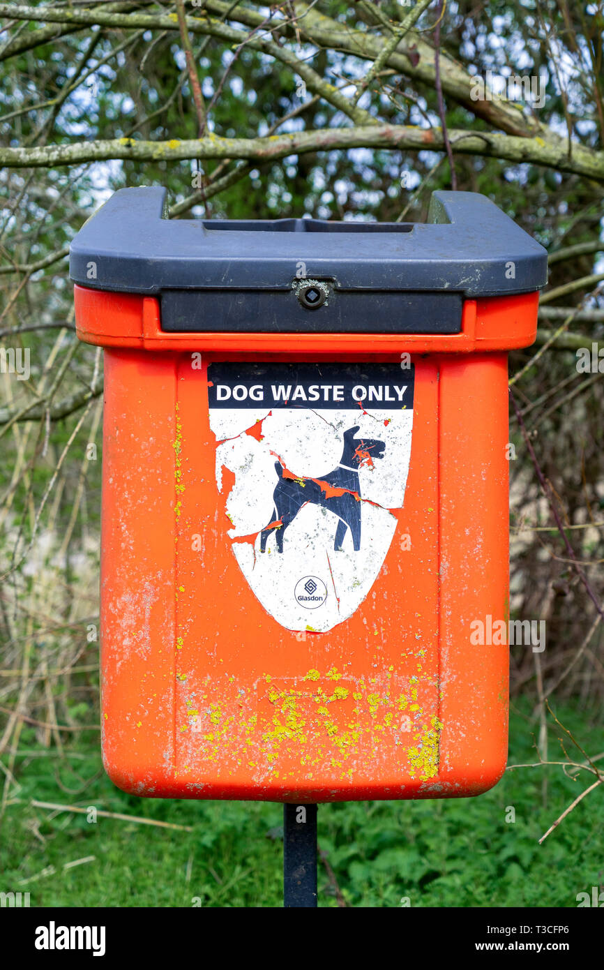 Old dog waste disposal bin Stock Photo