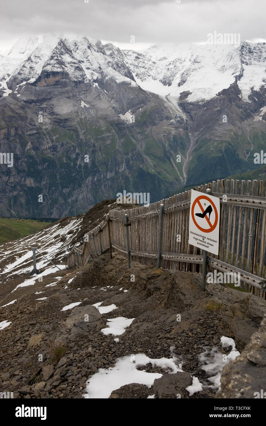 High-heeled shoes prohibited! Somewhat unnecessary sign at the top of the Schilthorn, Bernese Oberland, Switzerland Stock Photo