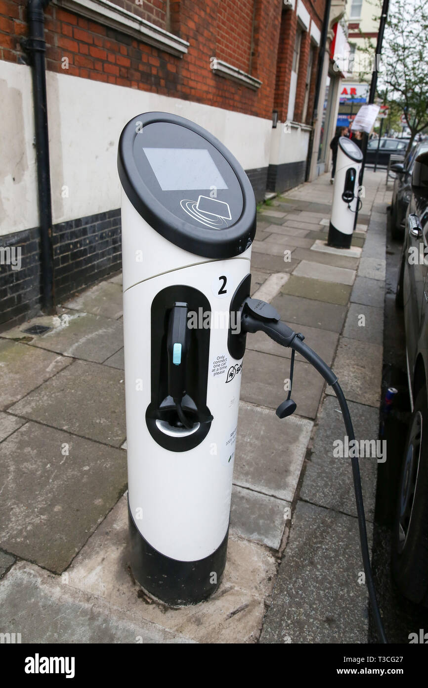 An electric car charging point is seen in London.  To help improve air quality, an Ultra-Low Emission Zone (ULEZ) which came into force on Monday 8 April 2019, now operates 24 hours a day, 7 days a week, within the same area of central London as the Congestion Charge.  Drivers must meet the ULEZ emissions standards or have to pay a daily charge, in addition to Congestion Charge to drive within the zone. Stock Photo