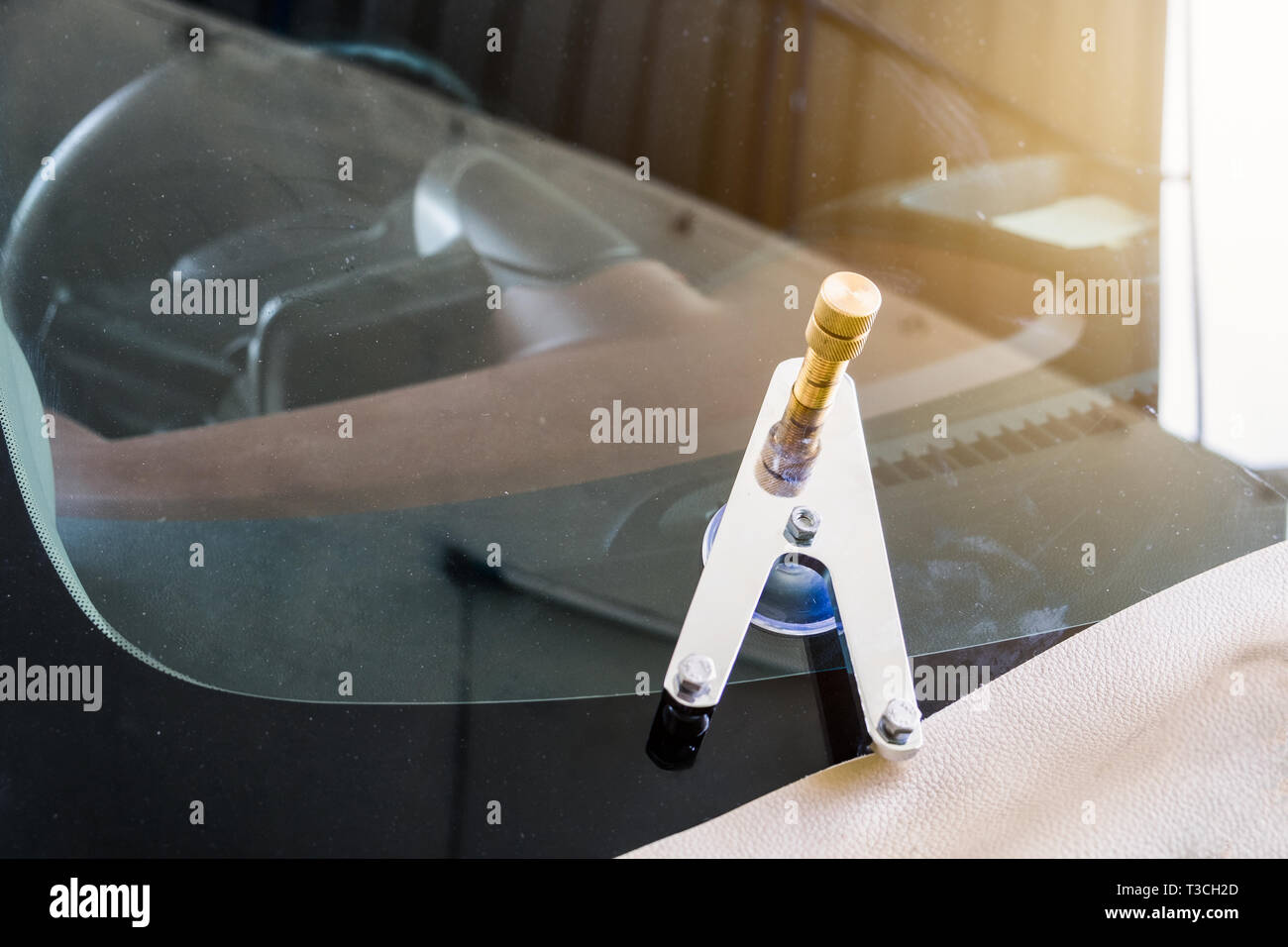 Using tools repairing to fix crack windshield Stock Photo
