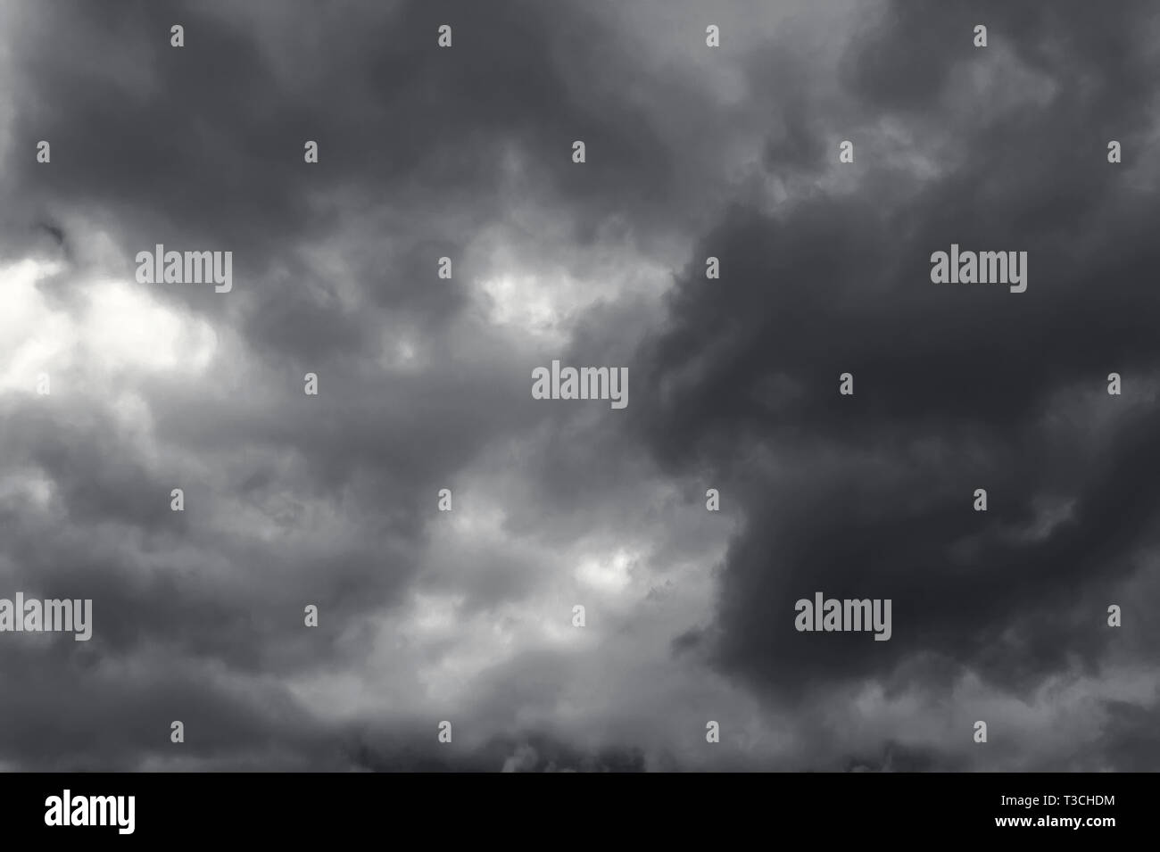 Dark and Dramatic Storm Clouds Area Background Stock Photo