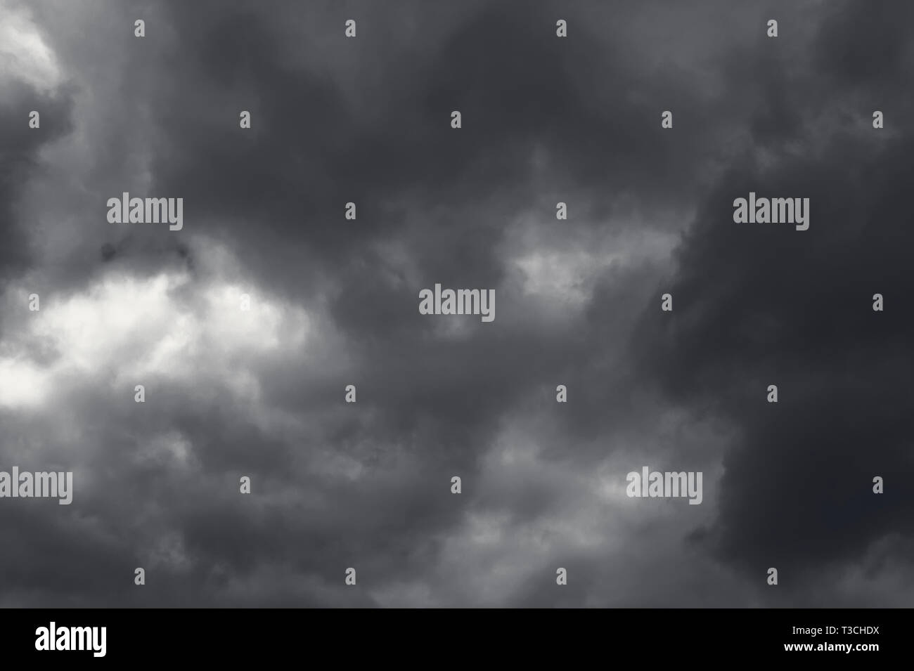 Dark and Dramatic Storm Clouds Area Background Stock Photo