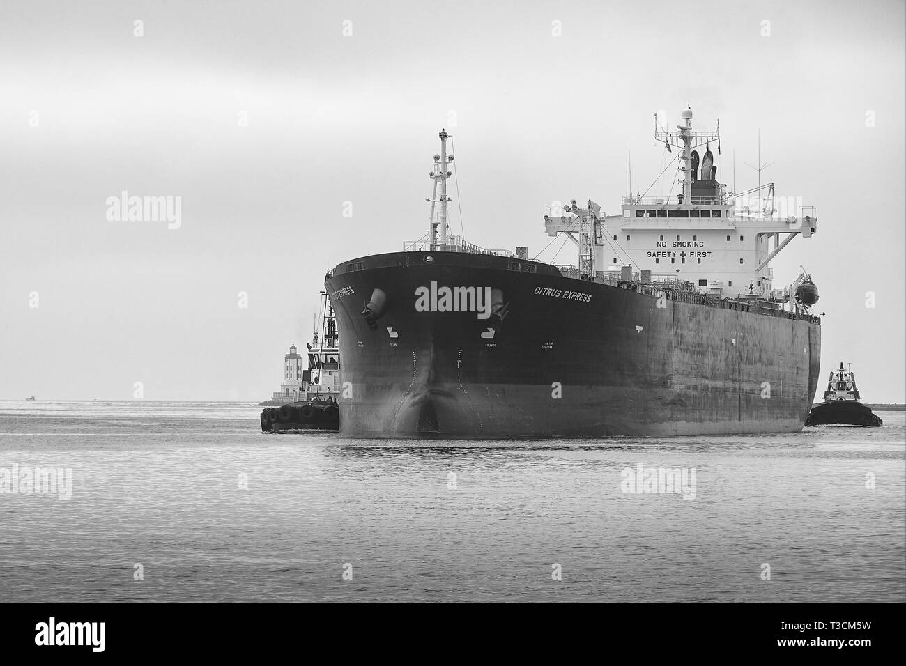Black & White Photo Of The Oil Products Tanker, CITRUS EXPRESS, Entering The Los Angeles Main Channel At The Port Of Los Angeles, California, USA. Stock Photo
