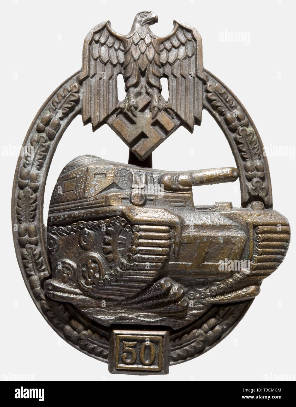 A Tank Assault Badge in Bronze, for '50' engagements Bronzed fine zinc issue without maker's mark. The solid wreath with '50' numeral plate, inset attachment pin with waisted steel needle, double riveted, hollow-stamped tank appliqué (Nie 7.06.04 c). historic, historical, 1930s, 1930s, 20th century, awards, award, German Reich, Third Reich, Nazi era, National Socialism, object, objects, stills, medal, decoration, medals, decorations, clipping, cut out, cut-out, cut-outs, honor, honour, National Socialist, Nazi, Nazi period, symbol, symbols, emblem, emblems, insignia, Editorial-Use-Only Stock Photo