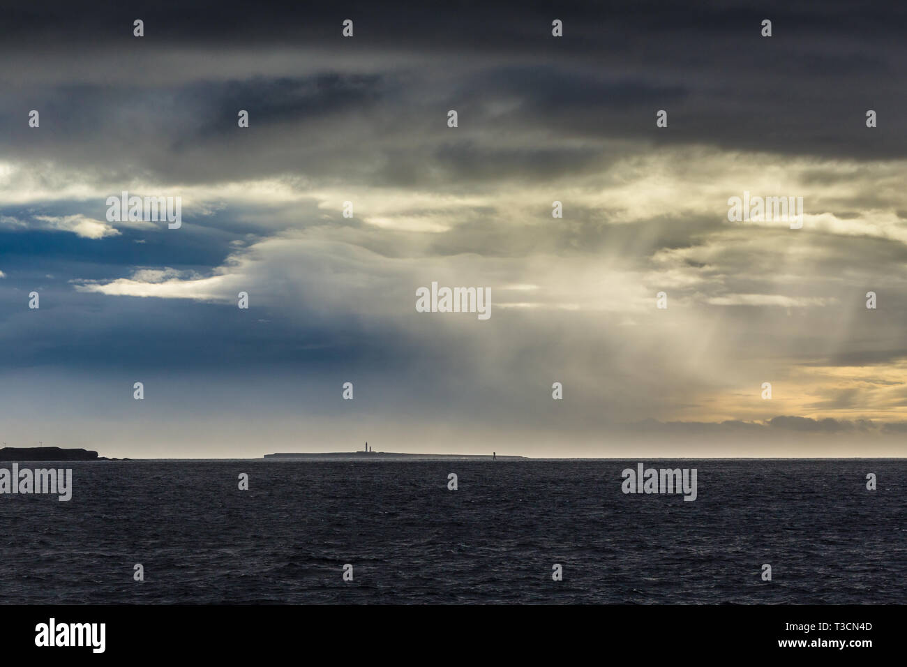 Dramatic weather over Muckle Skerry. in the Pentland Firth Stock Photo