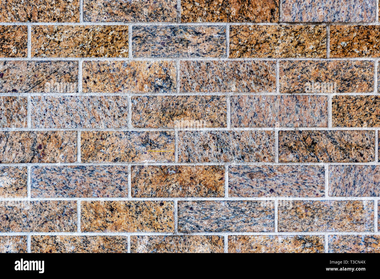 Close up of a granite brick-wall - Image Stock Photo - Alamy