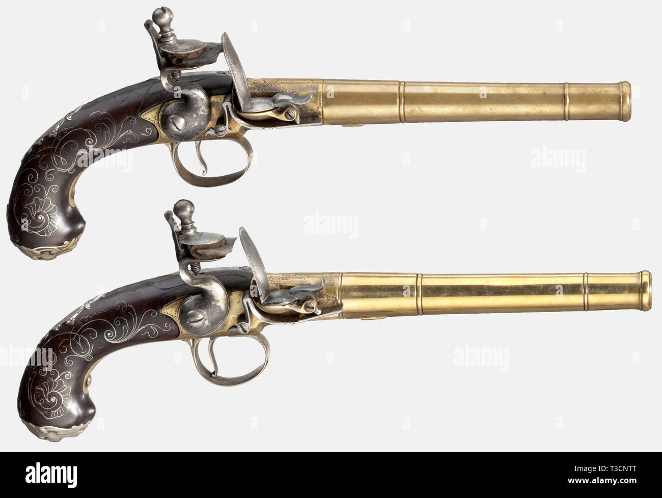 A cased pair of Queen Anne flintlock pistols, England, circa 1740. Smooth brass screw-barrels with lugs in 14 mm calibre with cannon muzzles. Floral engraved brass boxlocks inscribed 'LONDON' on the bottom along with English proof marks. Walnut grips with silver wire inlay, silver furniture decorated in relief, and grotesque mask pommel caps. Length of each 32.5 cm. In a later, velvet lined wooden case with a lug wrench, bullet mould, and powder horn. Key missing. Dimensions 36.5 x 27 x 7.5 cm. historic, historical, 18th century, civil handgun, c, Additional-Rights-Clearance-Info-Not-Available Stock Photo