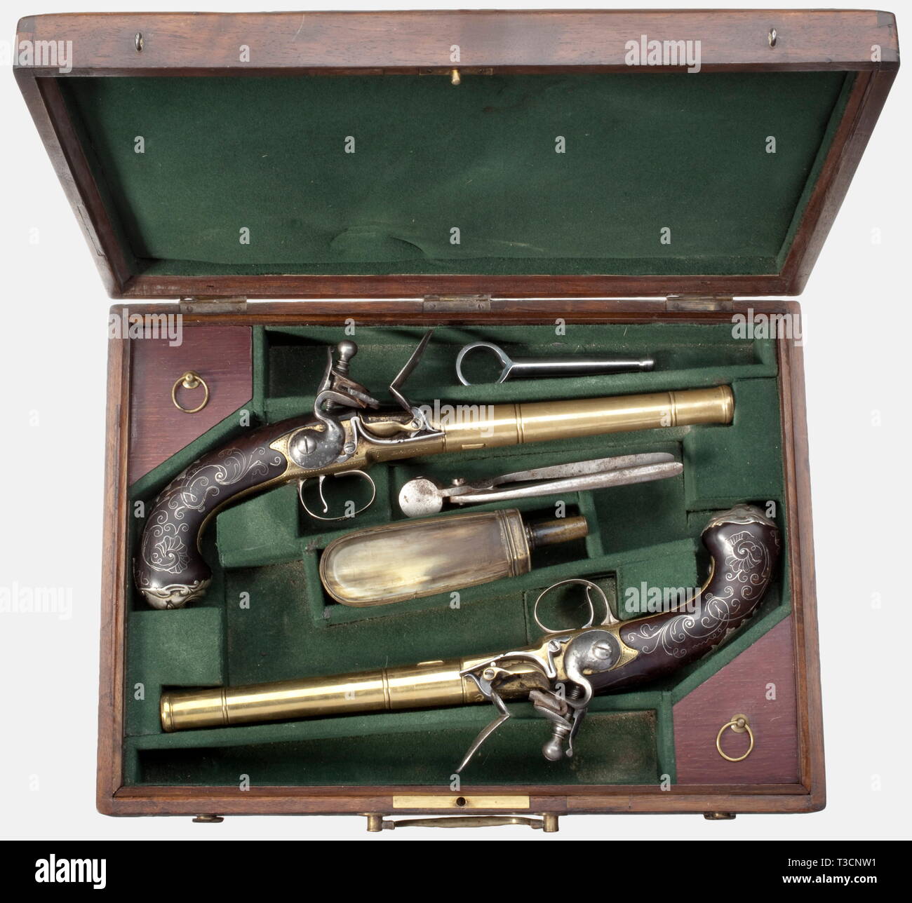 A cased pair of Queen Anne flintlock pistols, England, circa 1740. Smooth brass screw-barrels with lugs in 14 mm calibre with cannon muzzles. Floral engraved brass boxlocks inscribed 'LONDON' on the bottom along with English proof marks. Walnut grips with silver wire inlay, silver furniture decorated in relief, and grotesque mask pommel caps. Length of each 32.5 cm. In a later, velvet lined wooden case with a lug wrench, bullet mould, and powder horn. Key missing. Dimensions 36.5 x 27 x 7.5 cm. historic, historical, 18th century, civil handgun, c, Additional-Rights-Clearance-Info-Not-Available Stock Photo