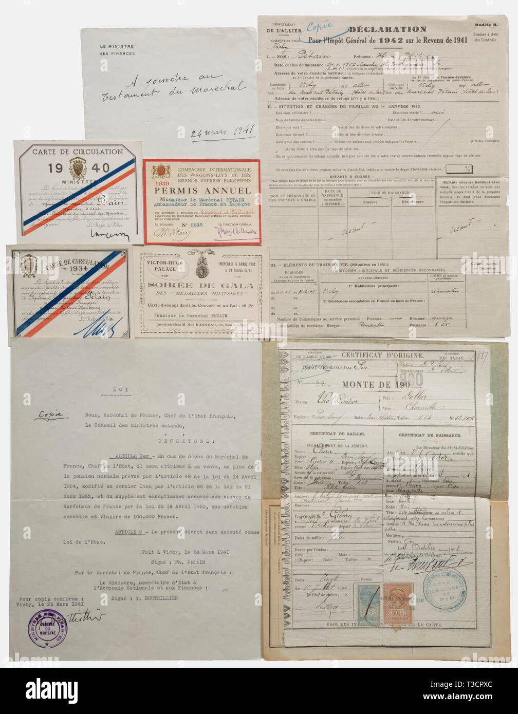 Marshal Philippe Pétain (1856 - 1951), personal documents Four dated sets of personal identity cards (1932, 1934, 1939, 1940), an 1880 pass as a Lieutenant of the Chasseurs à Pied, nine visiting cards as: battalion commander, Lieutenant Colonel (2x), Colonel, Commander of the 4th Infantry Brigade, Minister of War, Council Vice President, Ambassador, and Head of State, copy of the Law of 24 March 1941 with Pétain's hand written note, 'Copy', signed by Bouthillier as Finance Minister (Pension payment to Pétain's wife in the event of the Marshal's death) wit, No-Exclusive-Use | Editorial-Use-Only Stock Photo