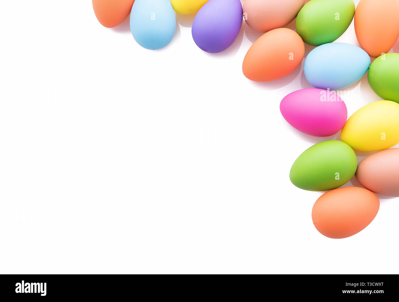 Colorful decorated easter eggs on white background with copy space Stock Photo