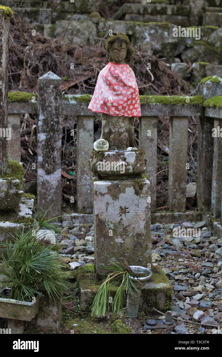 A bibbed Jizo statue at Okunoin cemetery in Koyasan, Japan Stock Photo