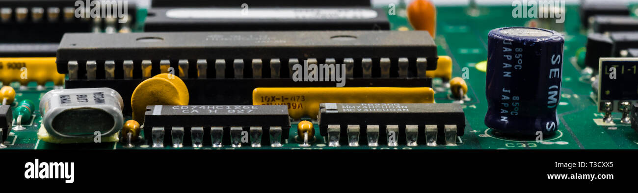 Computer mother board components showing close up of tiny parts in ...