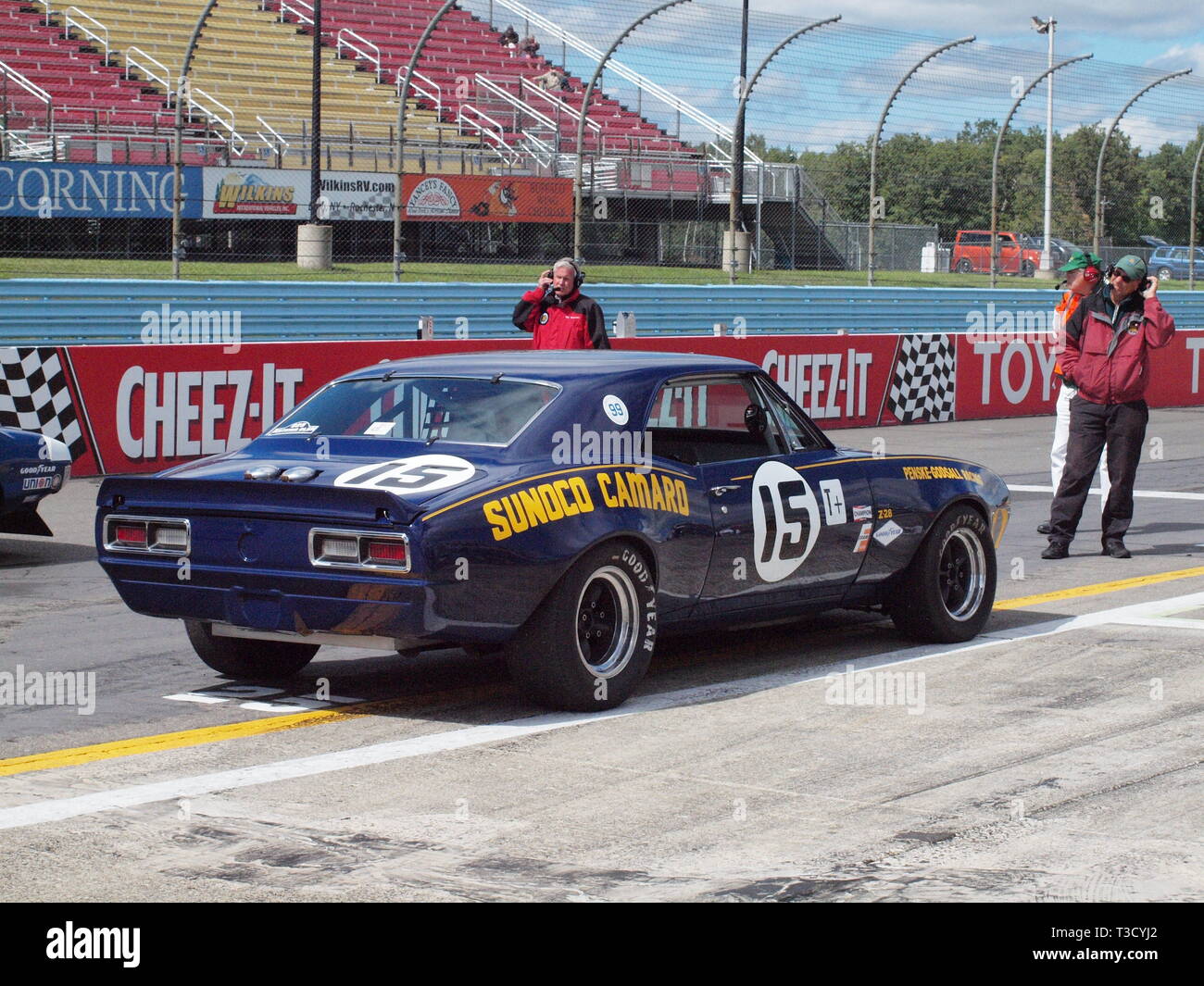 Famous Sunoco Trans-Am Camaro of the Penske Race team preparing for a vintage race at Watkins Glen race track in New Yorks Finger Lakes area. Stock Photo