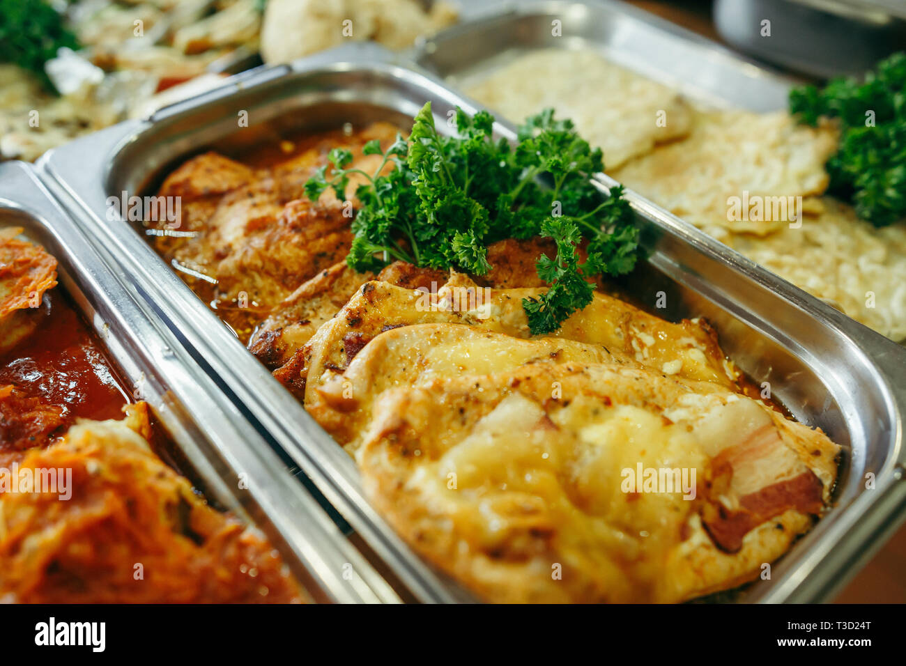banquet table with heater dish, in dining room Stock Photo - Alamy
