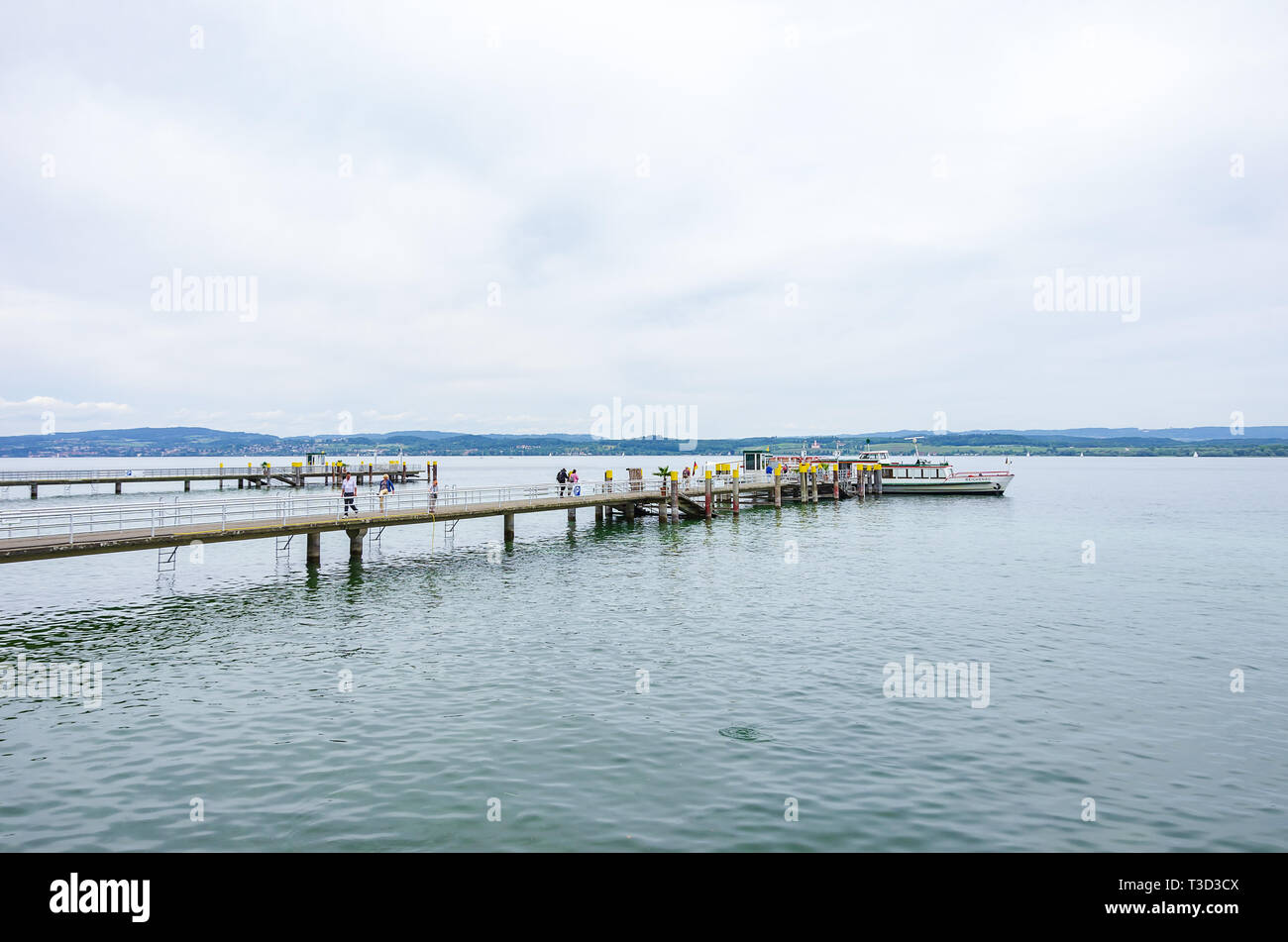 The excursion boat MS REICHENAU has docked at the landing stage of the Flower Island Mainau in Lake Constance, Baden-Wurttemberg, Germany, Europe. Stock Photo
