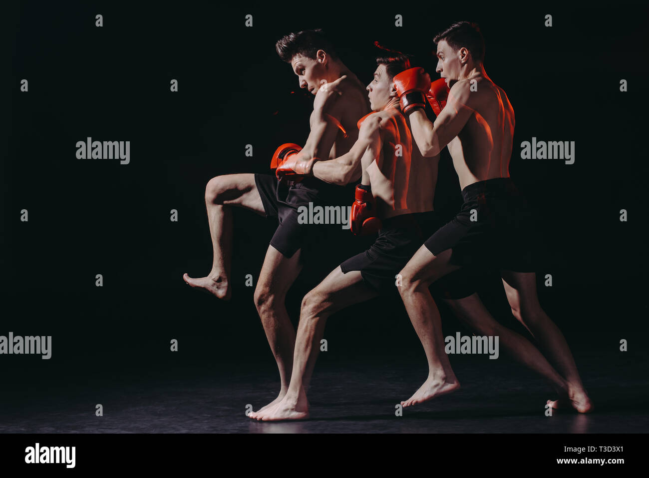 sequence shot of sporty muscular boxer in boxing gloves doing kick ...