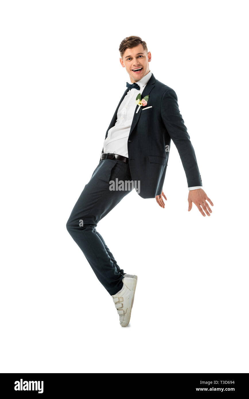 black suit and sneakers