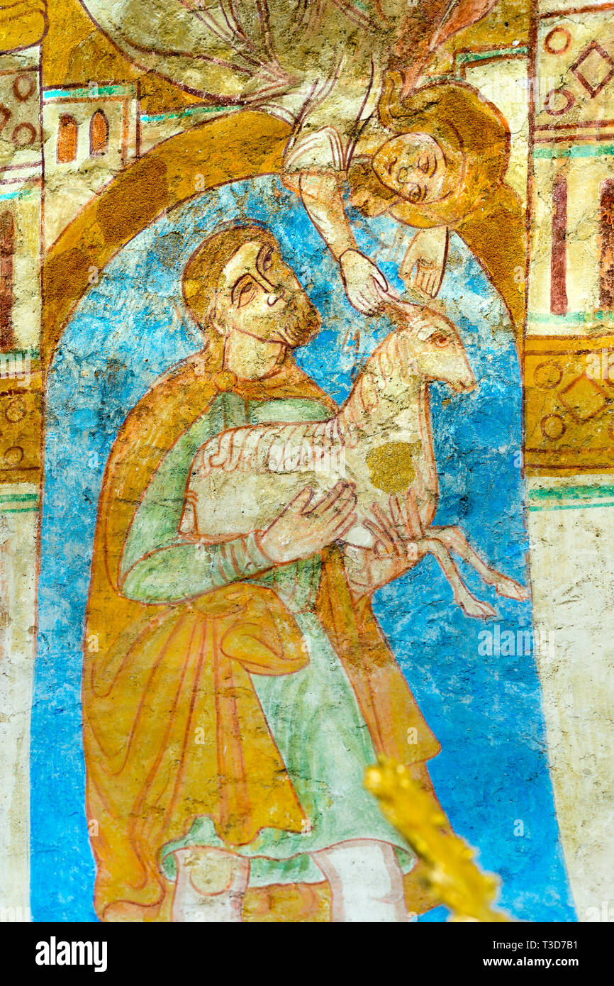 Abel sacrifices a lamb, withch is received by an angel, fresco in Engum church, Denmark, July 15, 2015, Stock Photo