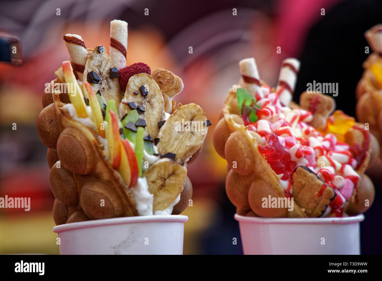 Fresh sweet bakery with candies and ice cream street food Stock Photo