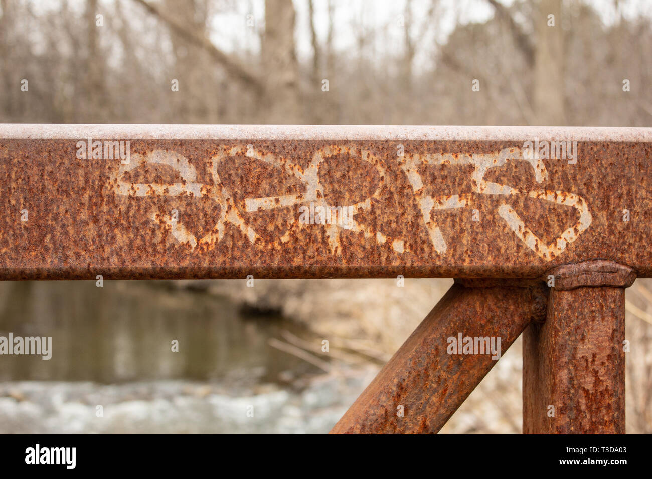Graffiti on an iron bridge. Stock Photo