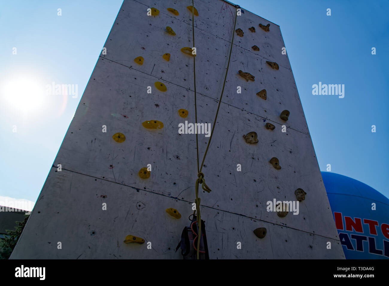 Artificial mountaineering wall indoors, empty climbing wall, sport