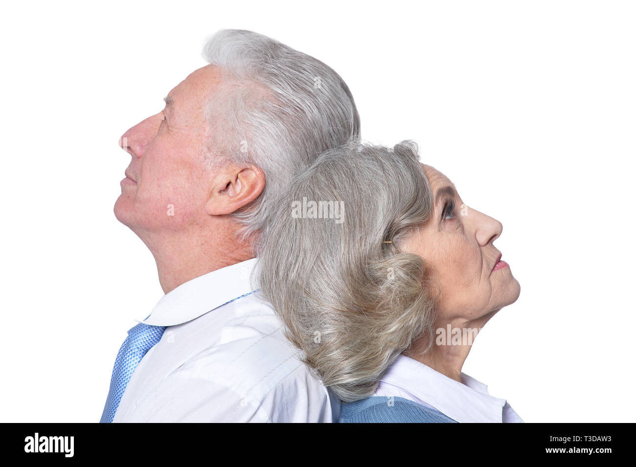 Portrait of sad senior couple on white background Stock Photo